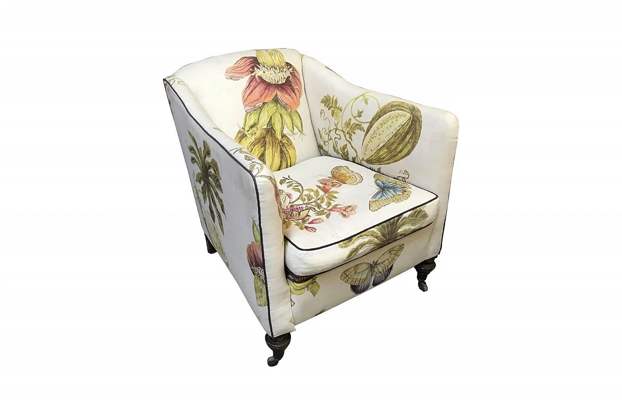 Armchair with wheels covered with floral fabric 1