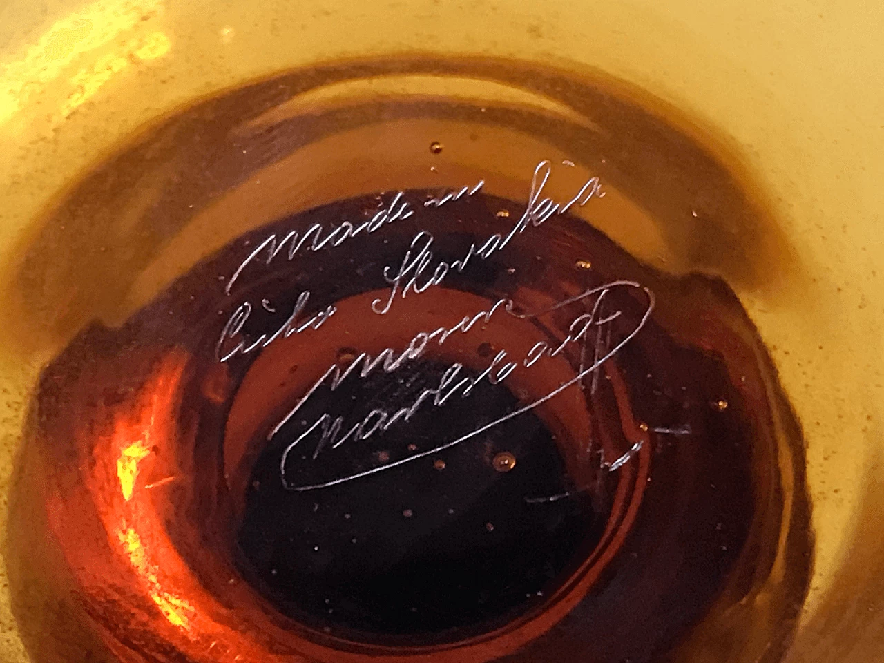 Czechoslovakian cup in amber glass, signed 5