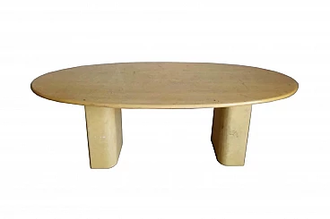 Large oval table in beige marble