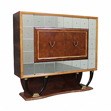 Sideboard with various essence and mirror, '40s