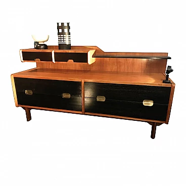 Small teak sideboard with ebonized and brass details, Dassi production, 50's