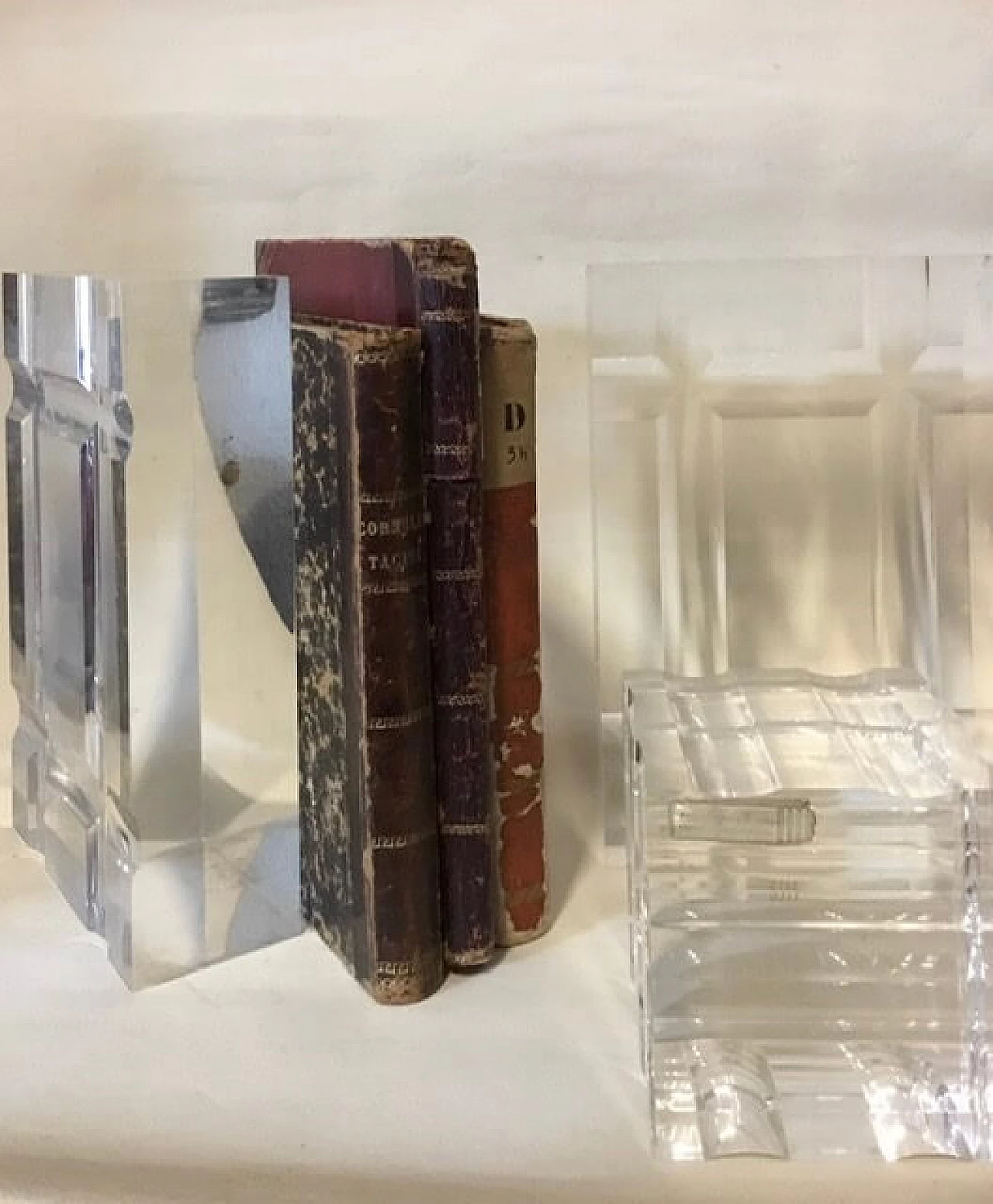 Pair of bookends and a plexiglass paperweight, 70s 1080540