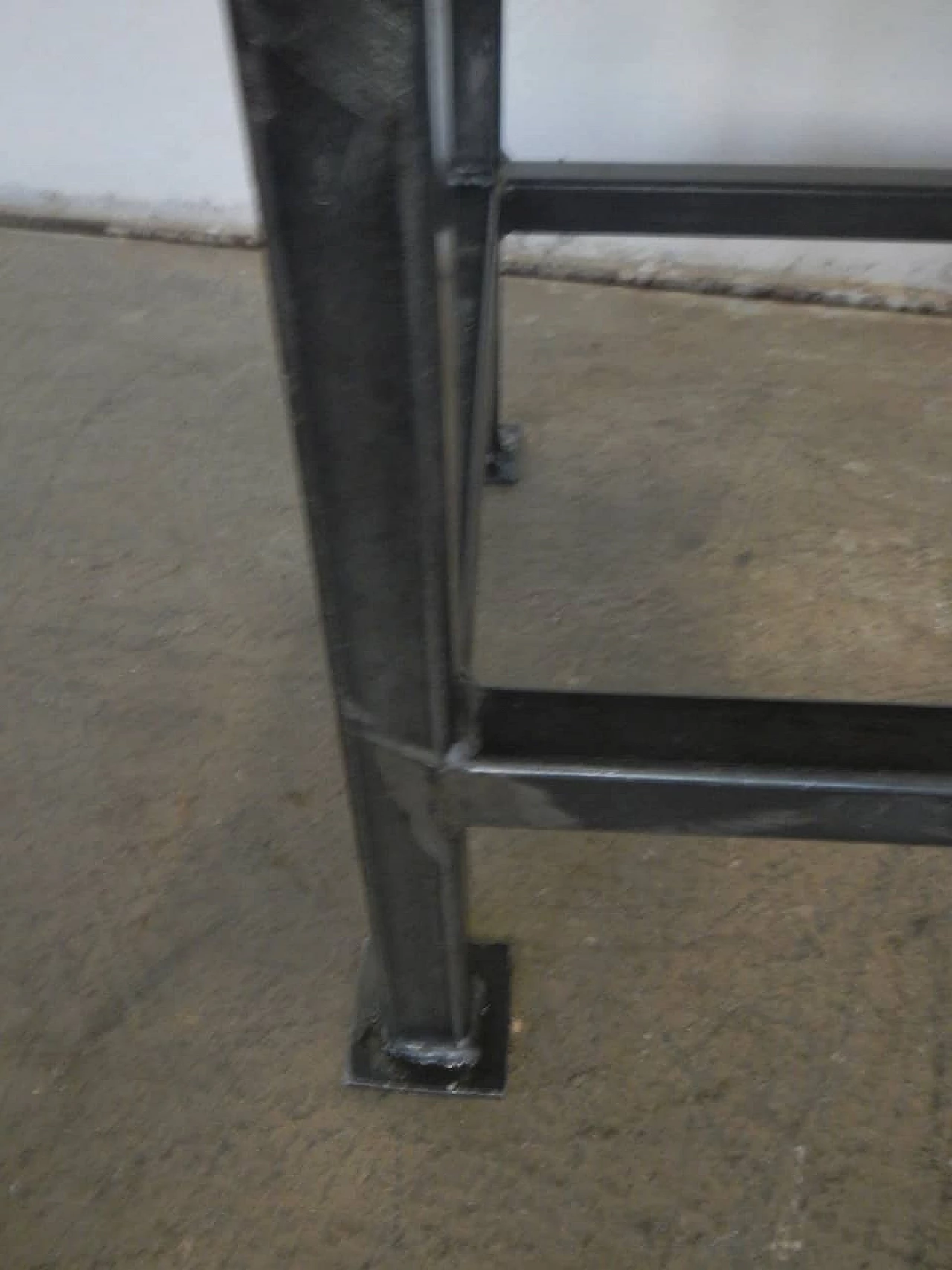 Pair of black metal and wood stools, 70s 1149289