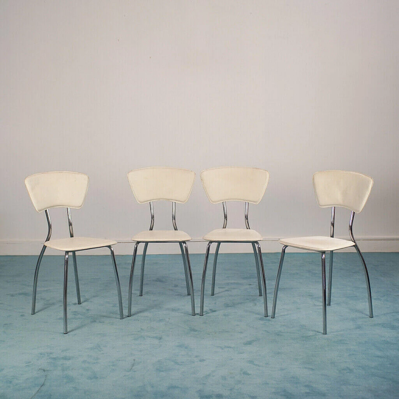 4 White steel and faux leather chairs, 80's 1156740
