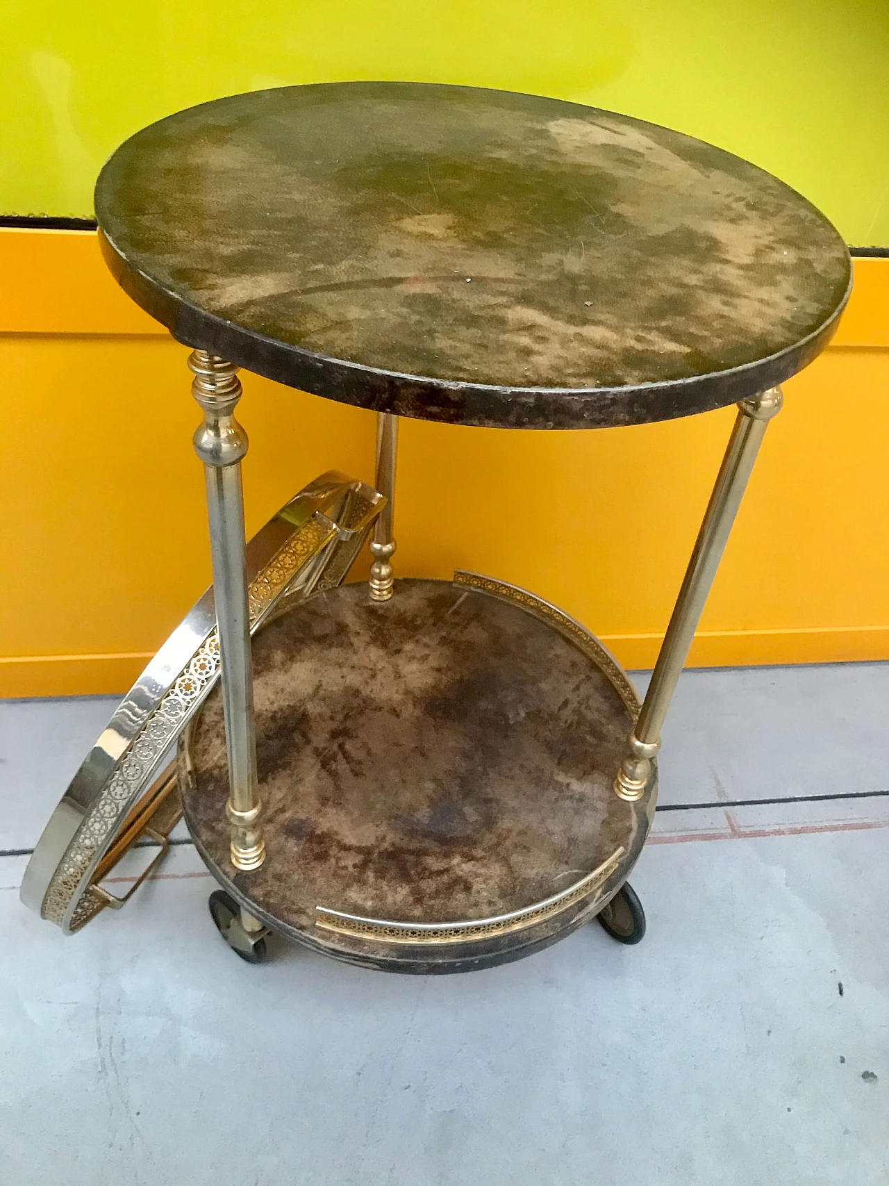 Aldo Tura's bar trolley in parchment and golden brass 1164280