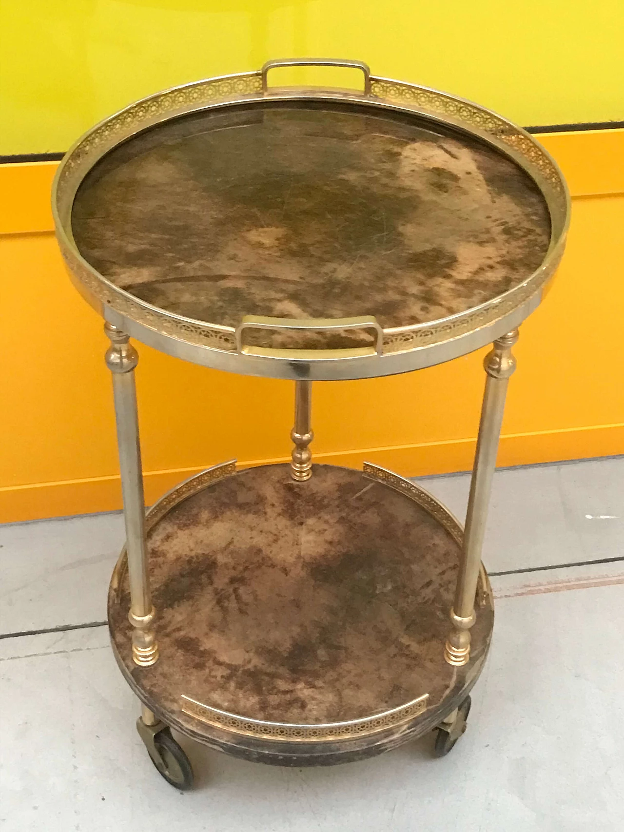 Aldo Tura's bar trolley in parchment and golden brass 1164286