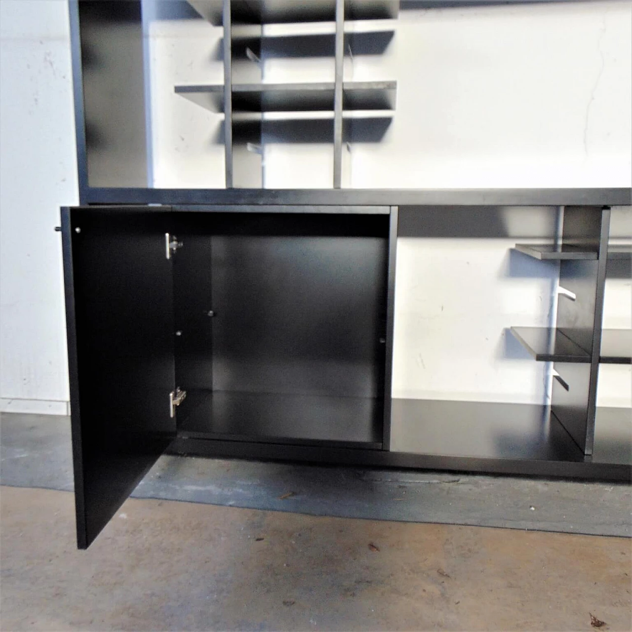 Satin black bookcase with modular interior, 80s 1165184