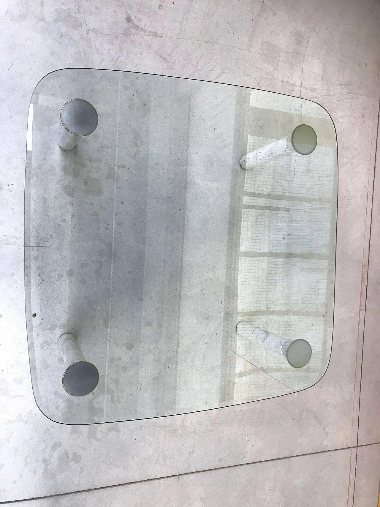 Glass top coffee table with marble legs, 60s 1166107