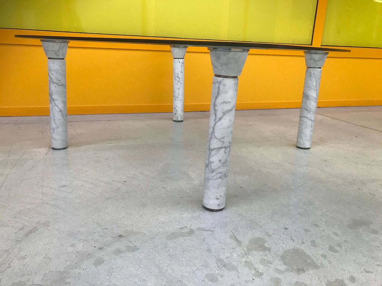 Glass top coffee table with marble legs, 60s 1166109
