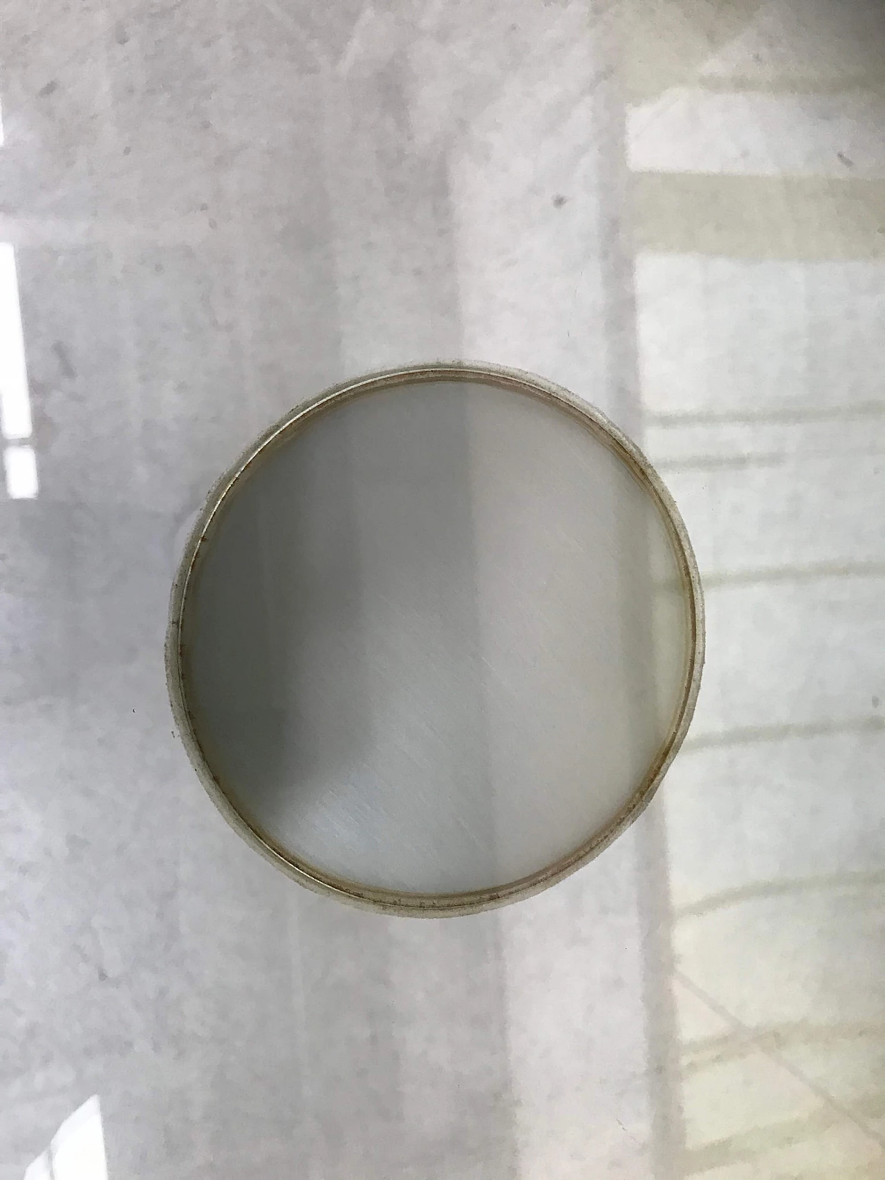 Glass top coffee table with marble legs, 60s 1166112