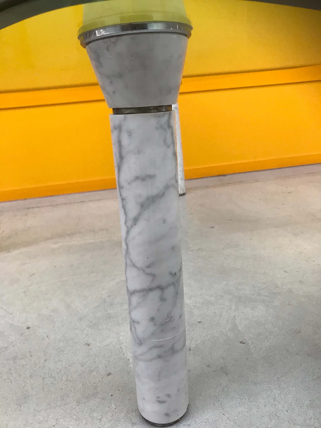 Glass top coffee table with marble legs, 60s 1166113