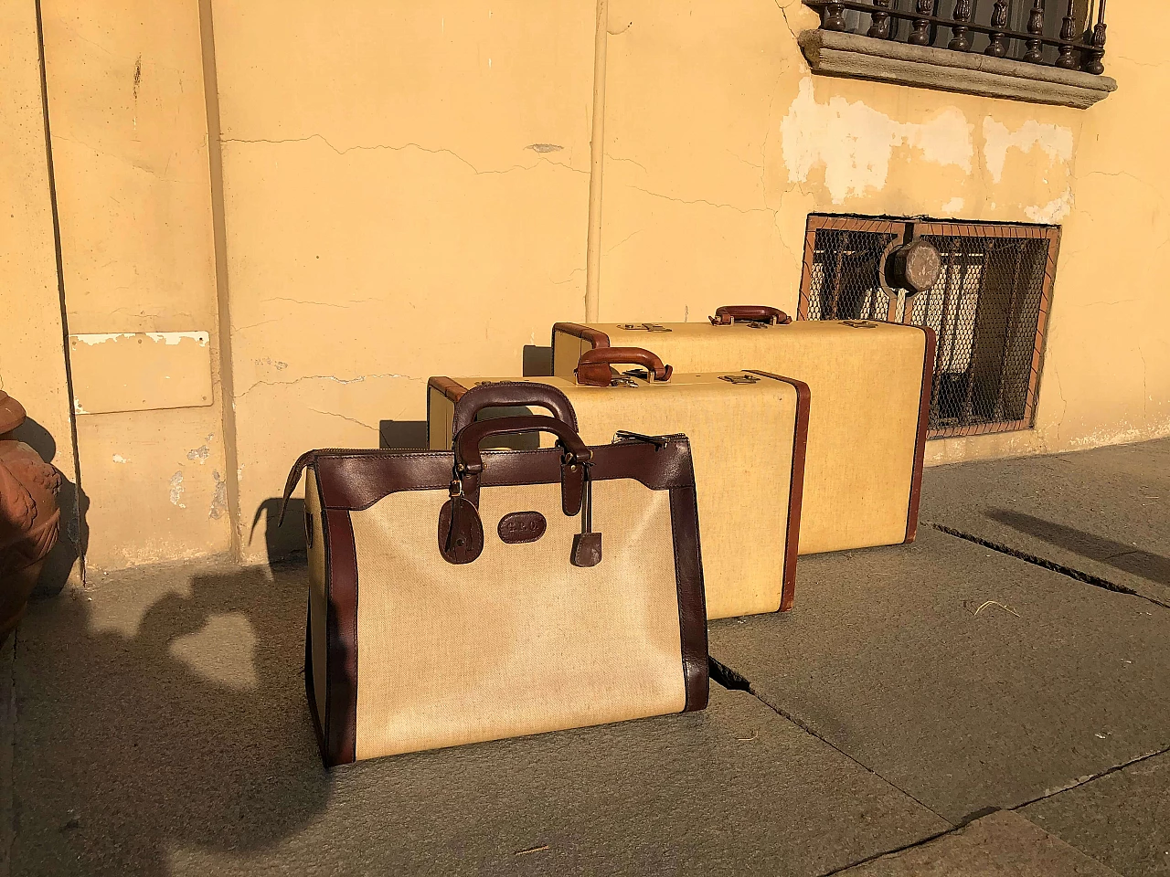 Set of leather and parchment suitcases 1167386