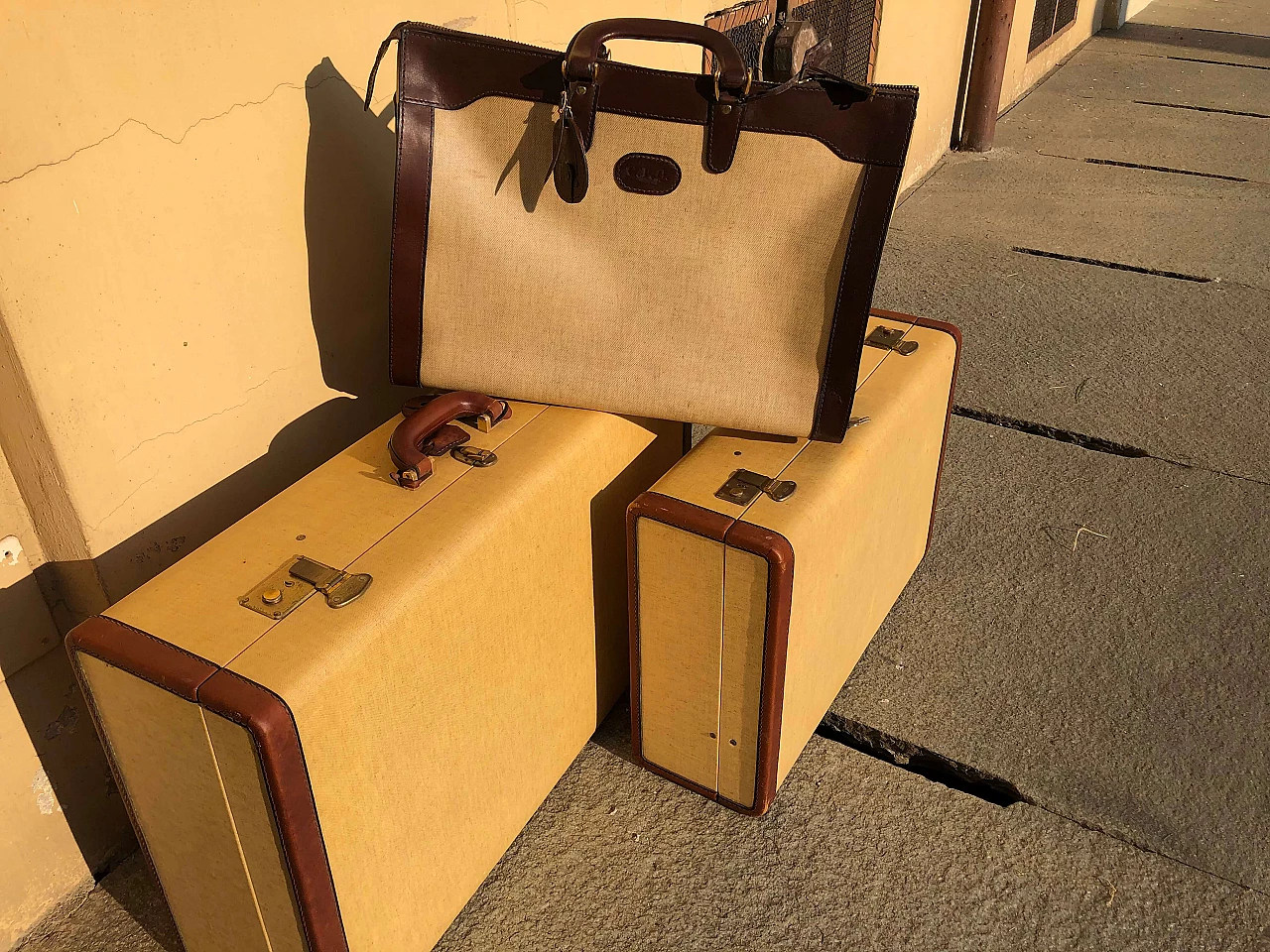 Set of leather and parchment suitcases 1167394