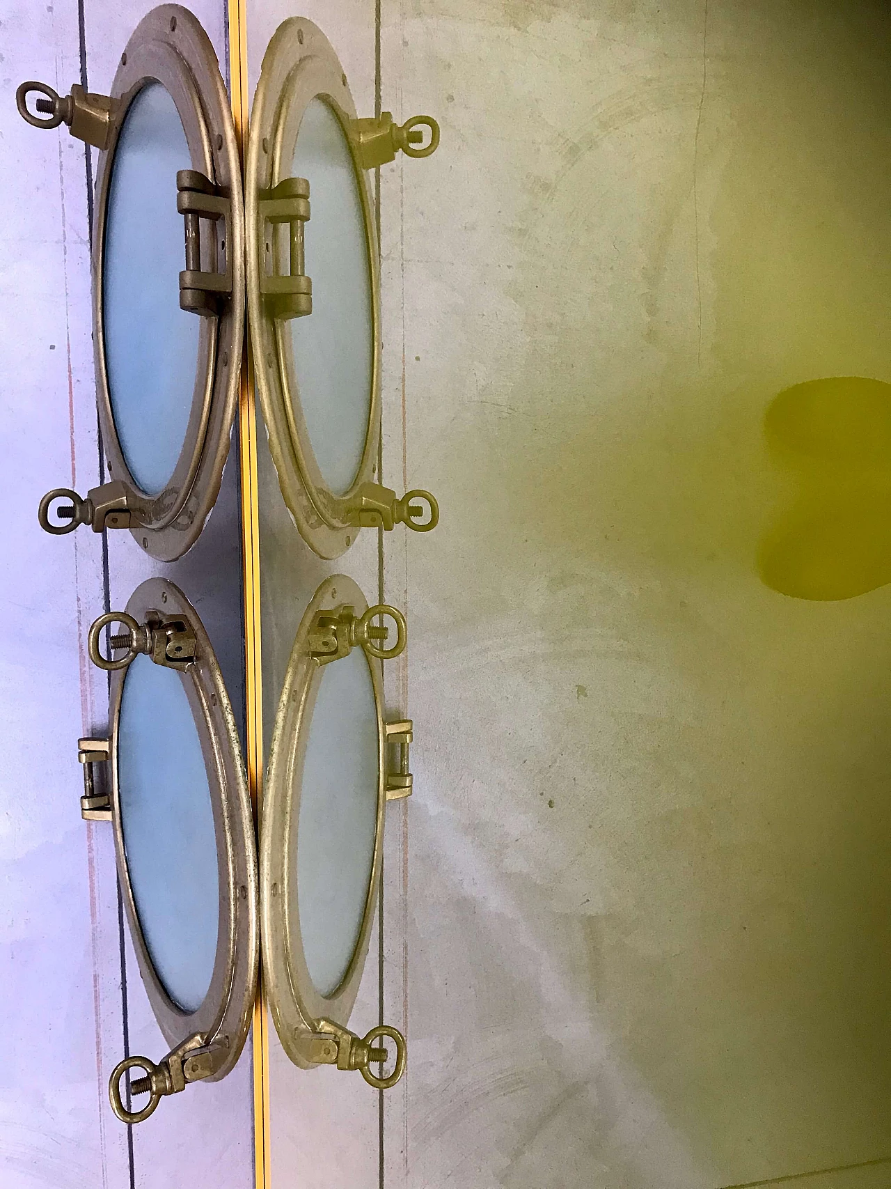Pair of nautical ship portholes in gilded brass, 60s 1169541