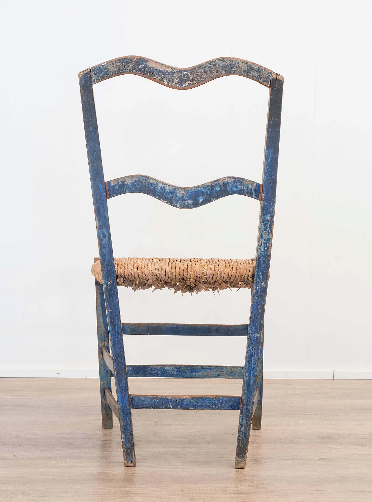 Rustic blue chair with saber legs, early 1900's 1084777
