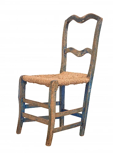 Rustic blue chair with saber legs, early 1900's
