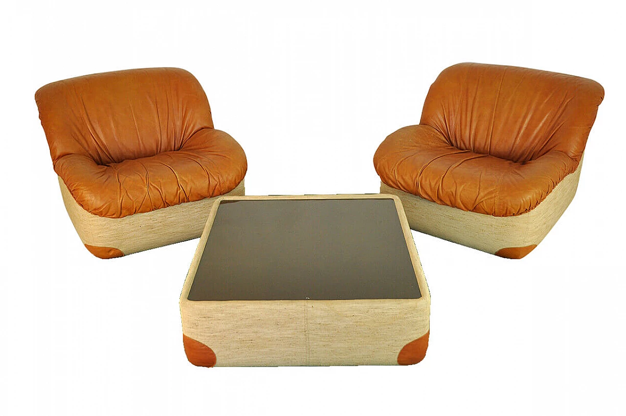 Pair of armchairs and coffee table, leather and fabric, 70's 1087587