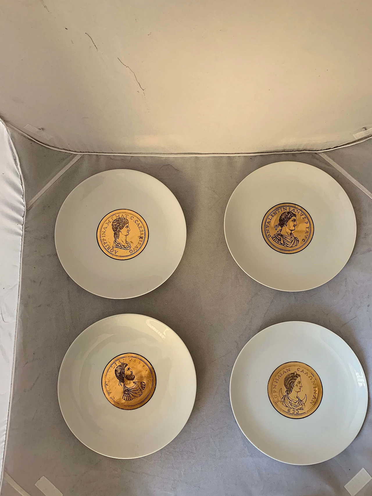 Set of 4 plates with Emperor's profiles by Atelier Fornasetti, Italy, 40s 1101584