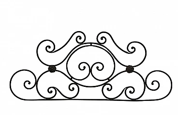 Wrought iron headboard with cast iron rosettes