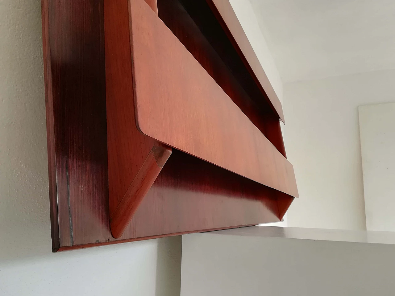 Teak and rosewood wall magazine rack, 1950s 1104896
