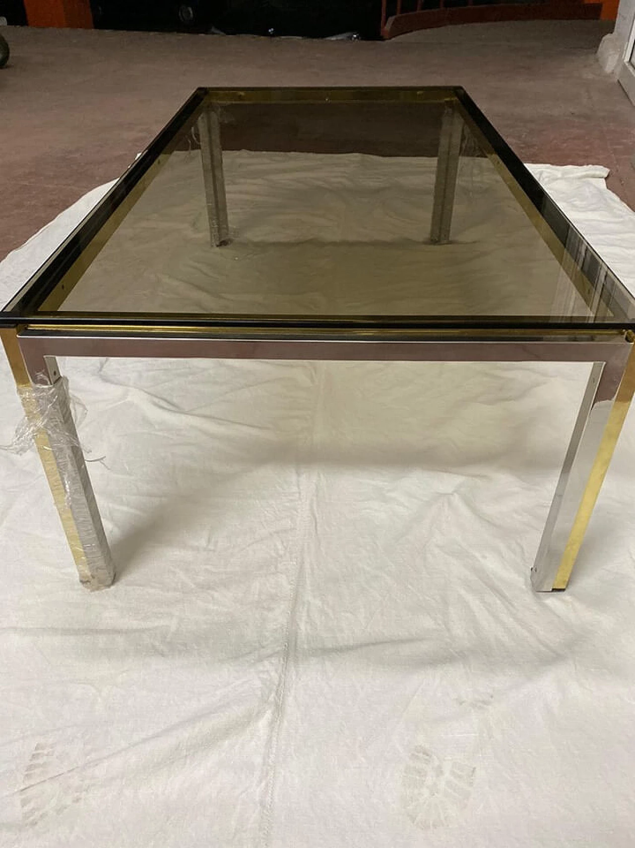 Coffee table in brass and smoked glass by Romeo Rega, 70's 1106240