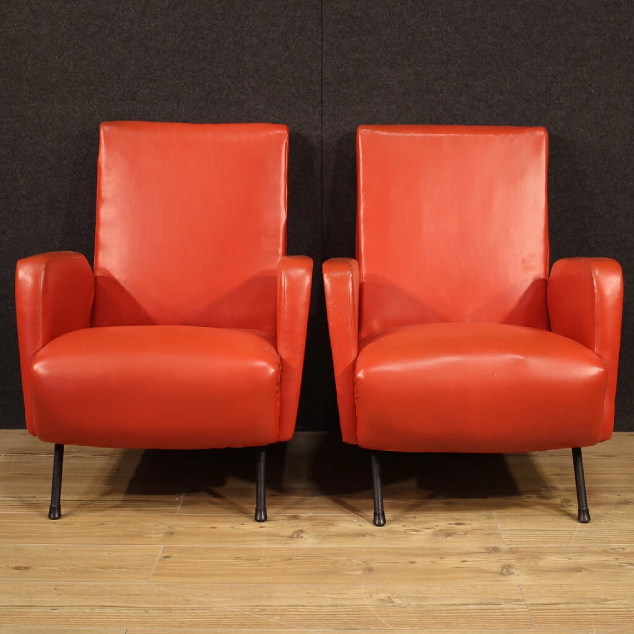Pair of Italian designer armchairs in imitation red leather 1120842
