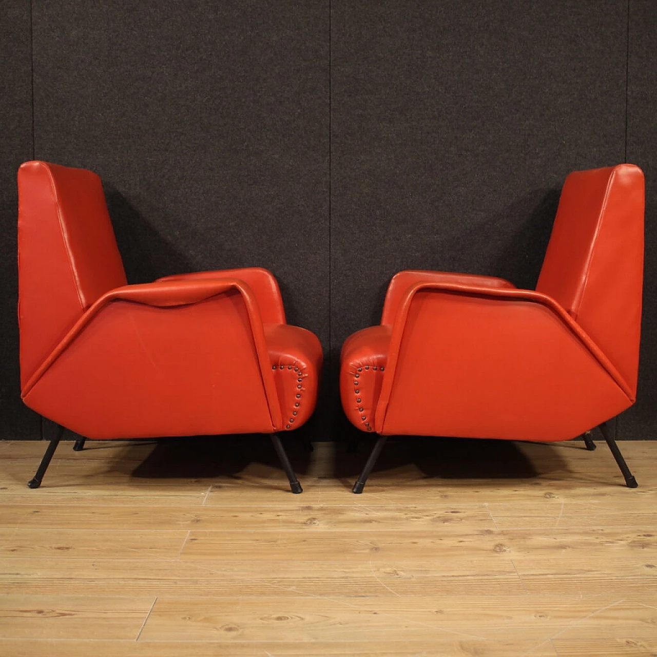 Pair of Italian designer armchairs in imitation red leather 1120843