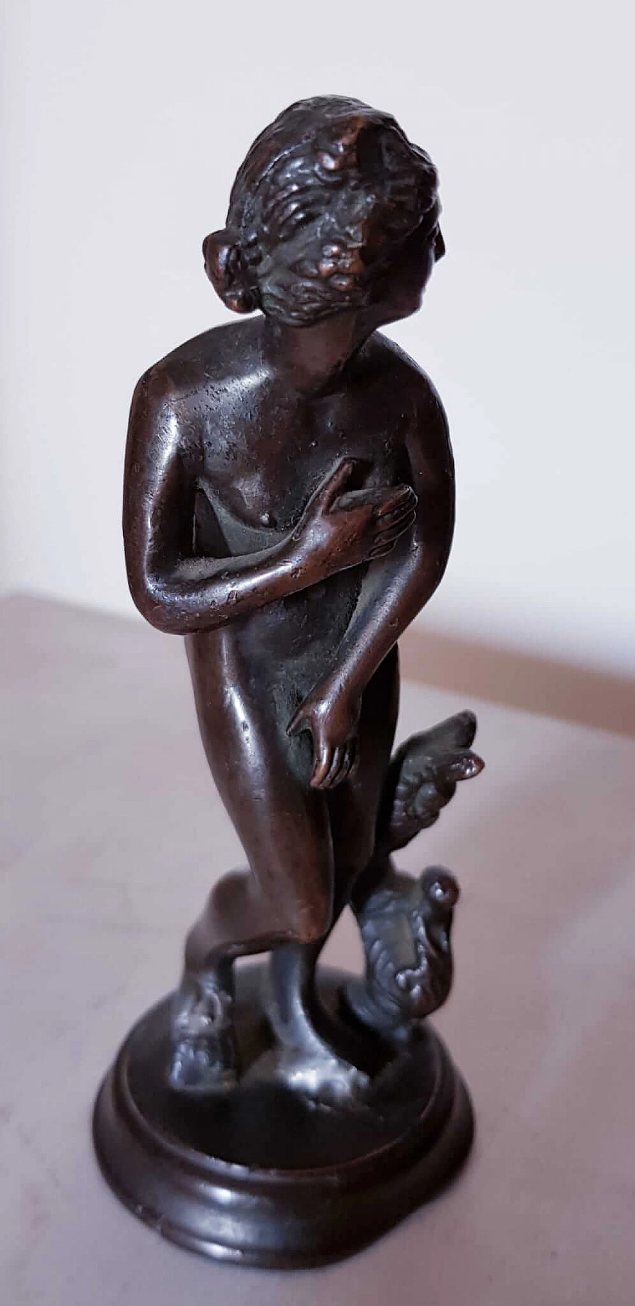 Bronze statue of a woman with triton 1131192