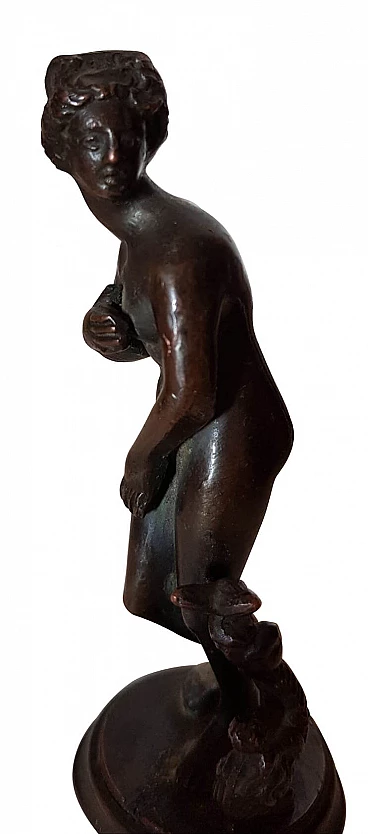 Bronze statue of a woman with triton