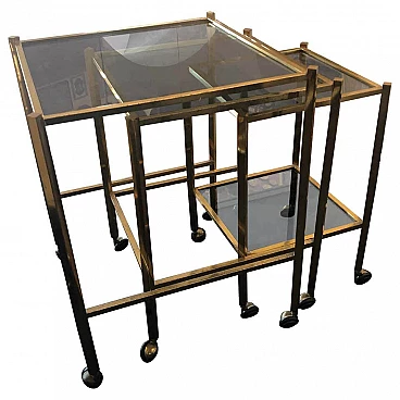 Set of 3 nesting tables in brass and smoked glass, 60s