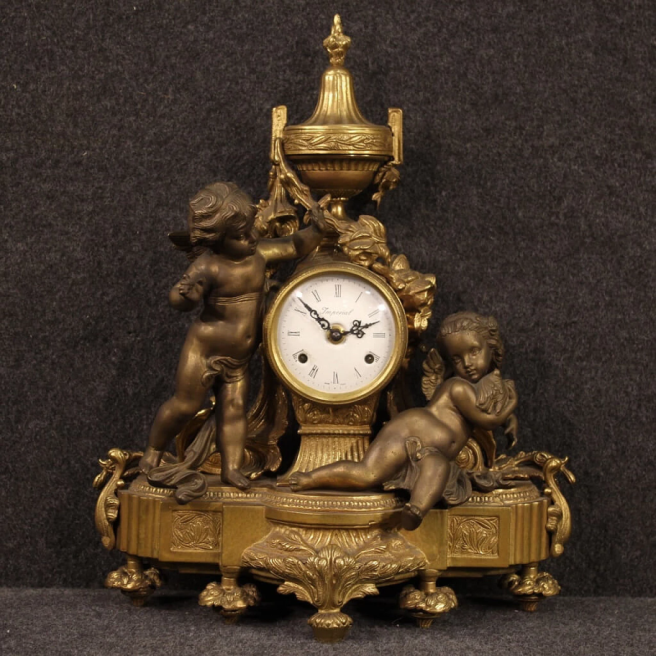 Orologio francese in bronzo e antimonio dorato 1142226