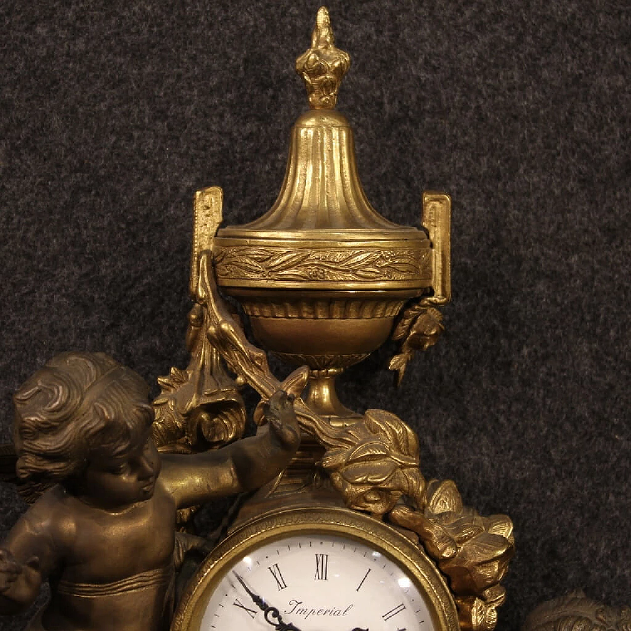 Orologio francese in bronzo e antimonio dorato 1142230