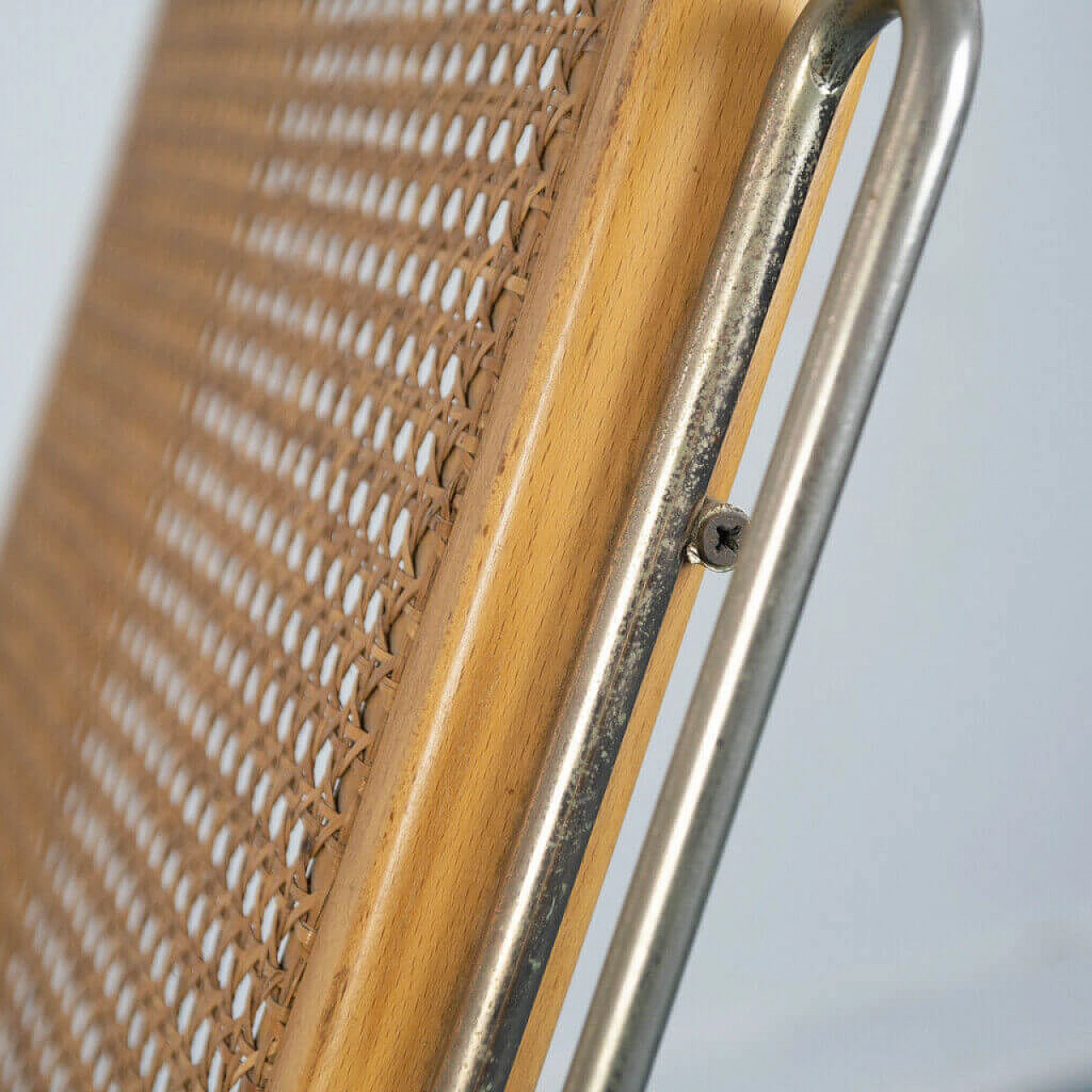 Sedia a dondolo in acciaio e paglia di Vienna, anni '70 1142973