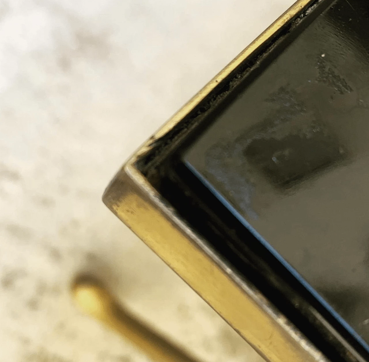 Faux bamboo coffee table in gilded brass with black glass top, 60s 1143857