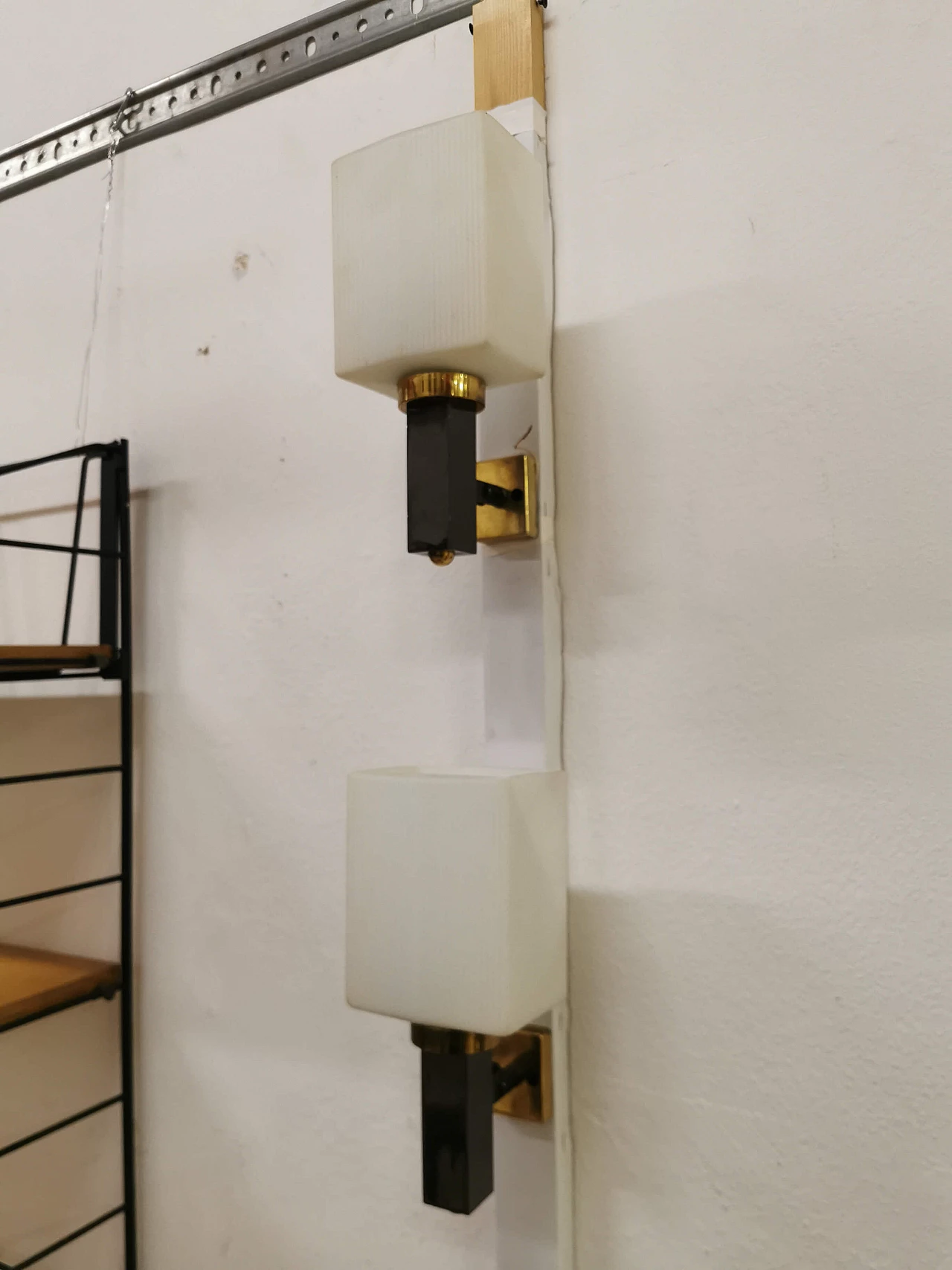 Pair of Stilnovo wall lamps in brass and opaline glass, 60s 1186994