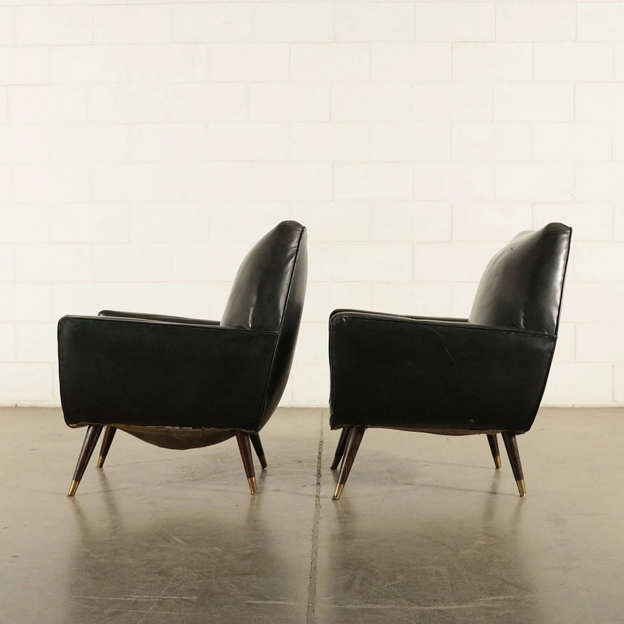 Pair of armchairs in wood and imitation leather, 60s 1189351