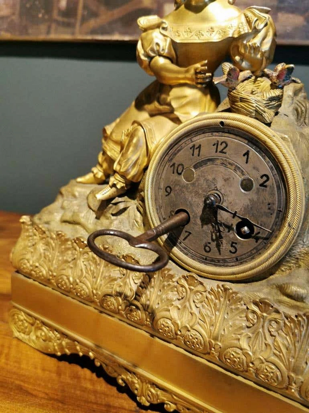 Orologio da camino in stile Luigi XVI in bronzo dorato 1193539