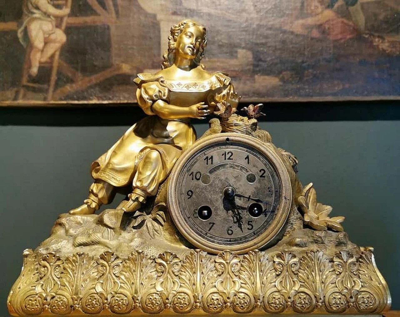 Orologio da camino in stile Luigi XVI in bronzo dorato 1193544