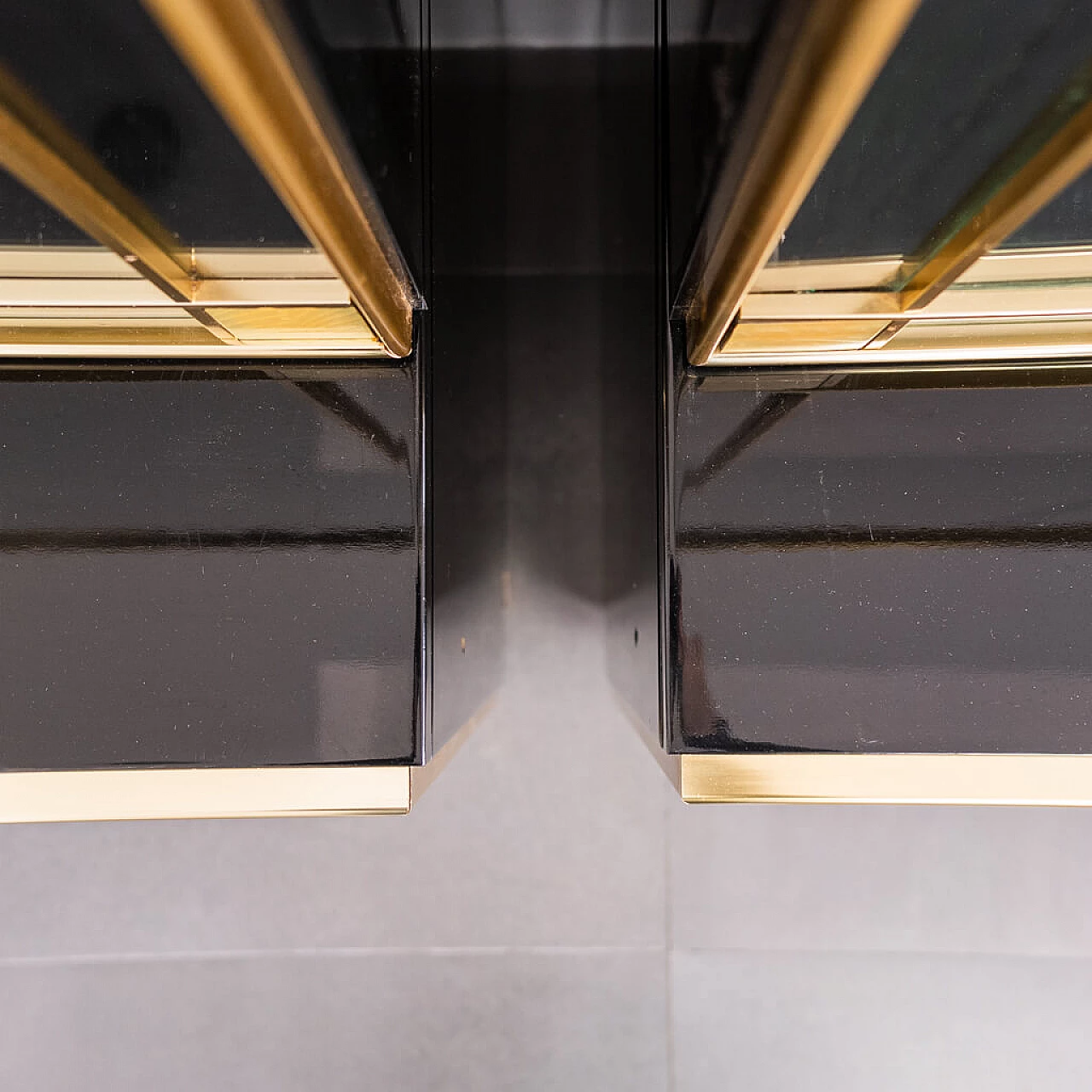 Pair of black showcase cabinets attributed to Pierre Cardin with brass details, 80s 1212272