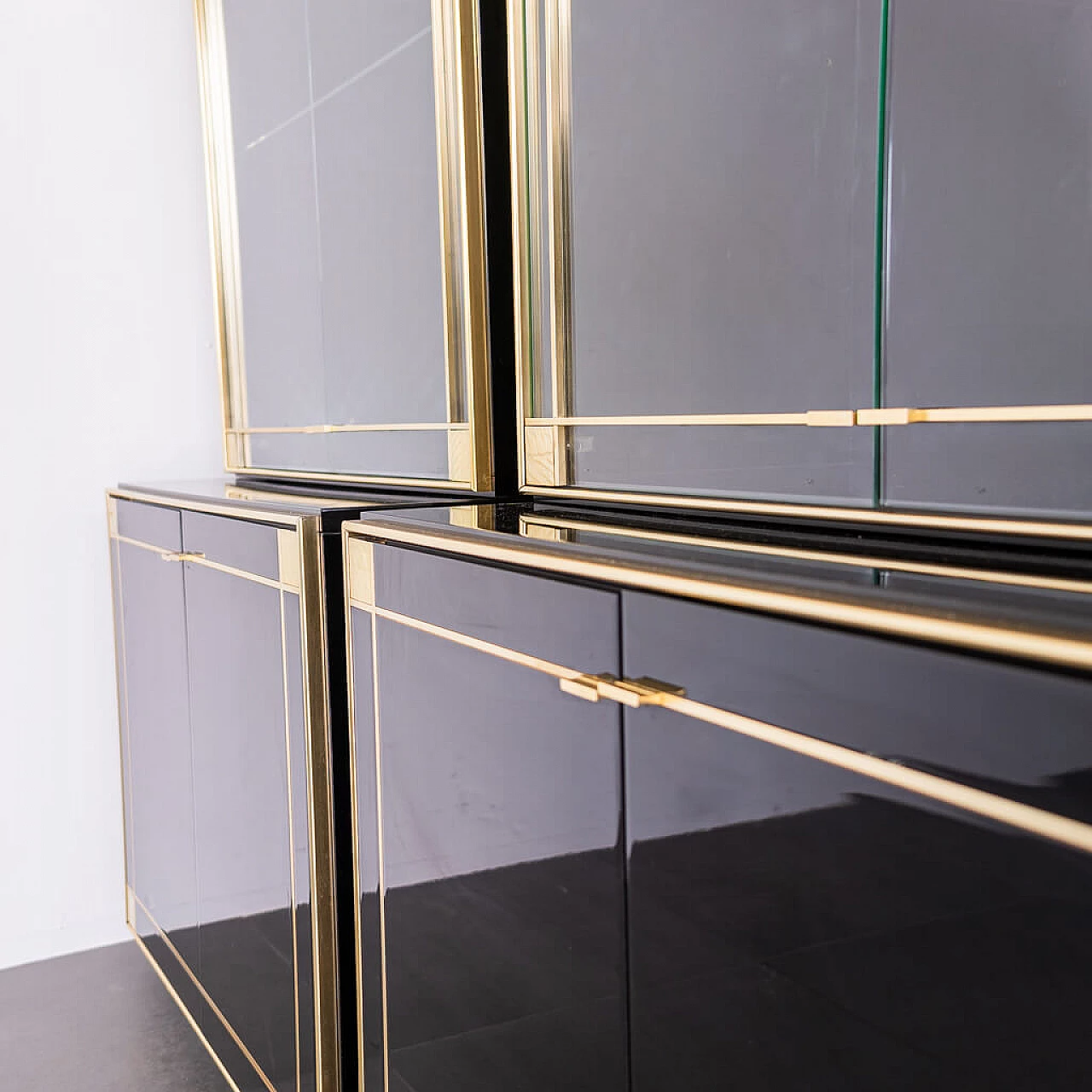Pair of black showcase cabinets attributed to Pierre Cardin with brass details, 80s 1212277
