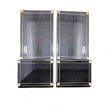 Pair of black showcase cabinets attributed to Pierre Cardin with brass details, 80s