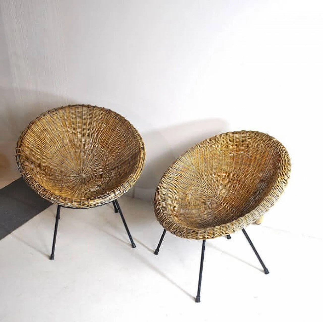 Pair of wicker egg chairs, 50s 1212545