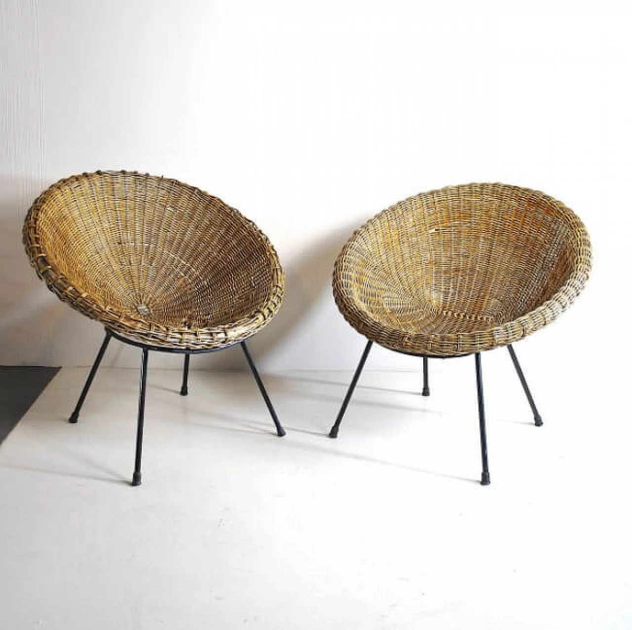 Pair of wicker egg chairs, 50s 1212549