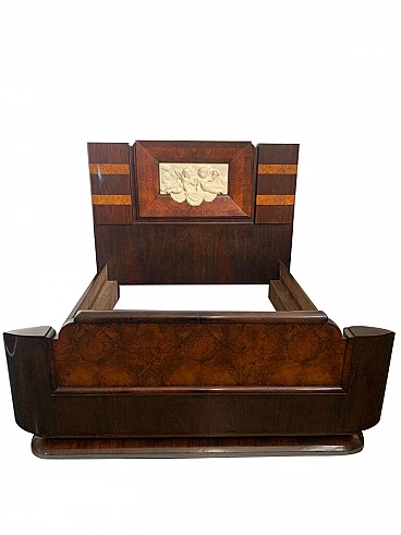 Art Deco bed in walnut and rosewood with carved headboard, 1920s