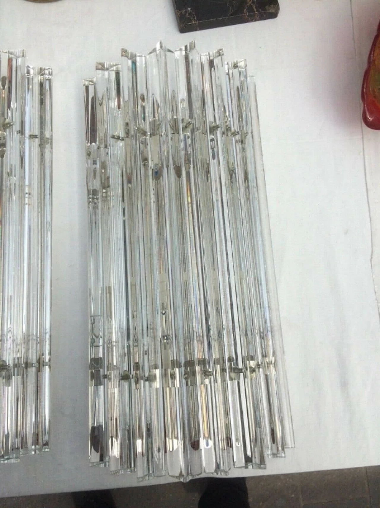 Coppia di applique a stecche in vetro di Murano e ottone 1219024