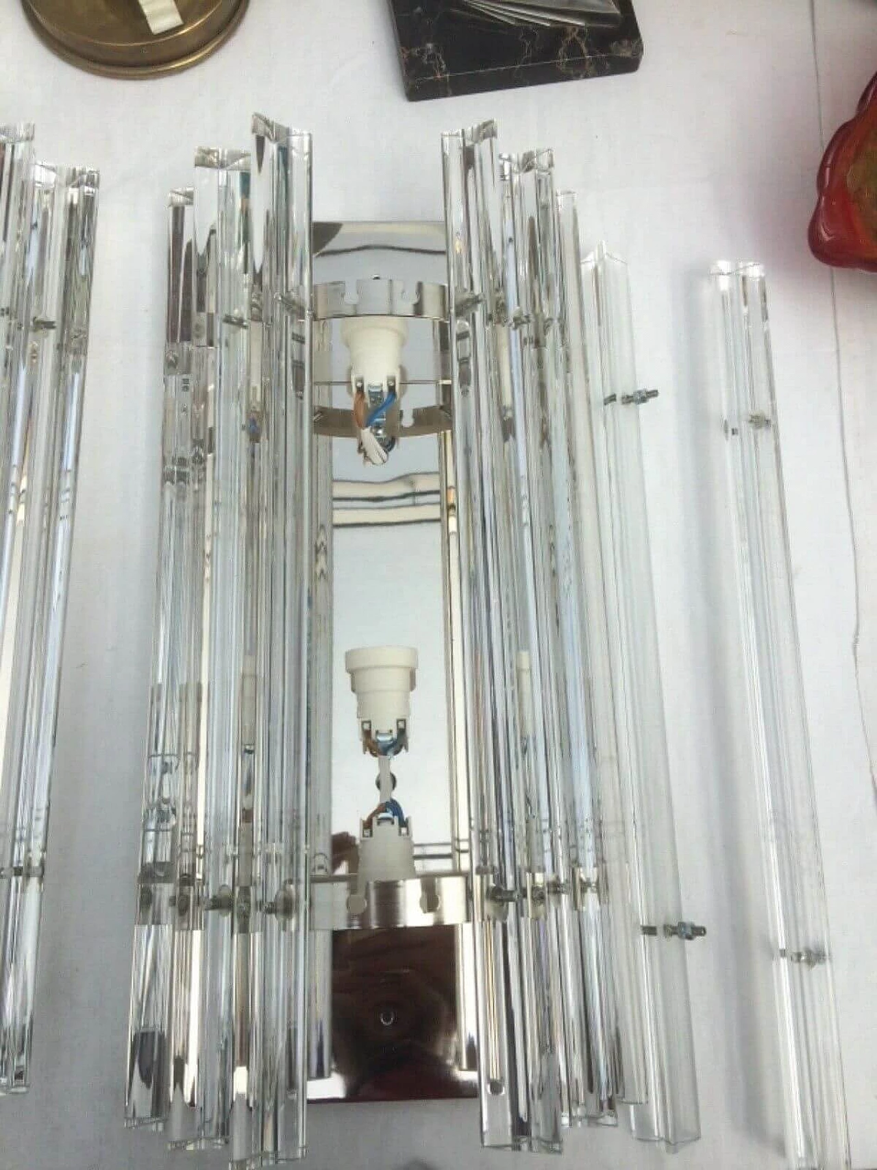 Coppia di applique a stecche in vetro di Murano e ottone 1219025