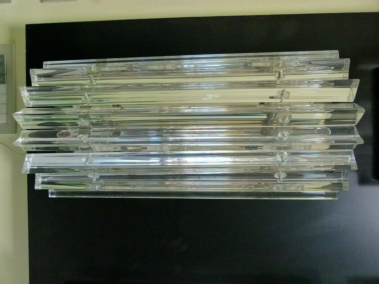 Coppia di applique a stecche in vetro di Murano e ottone 1219028