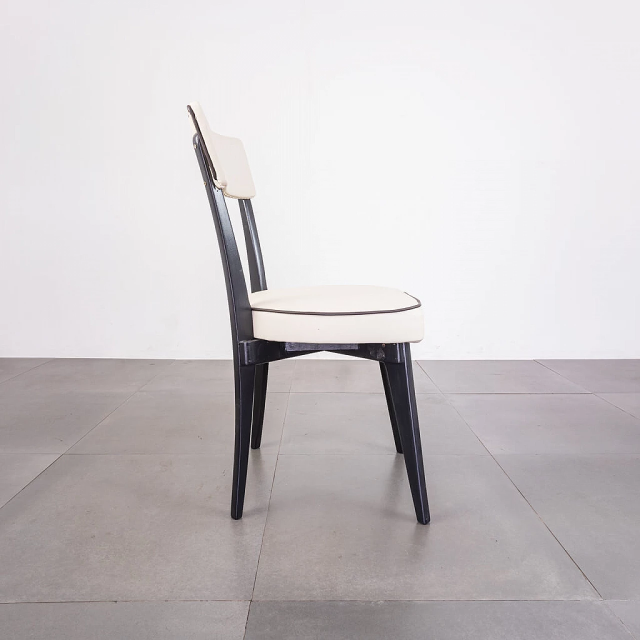 Chair in black wood and skai, 1940s 1224994