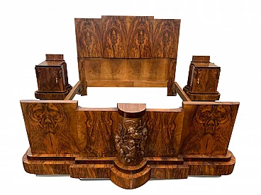 Art Deco walnut bed and pair of bedside tables by Ducrot, 1920s