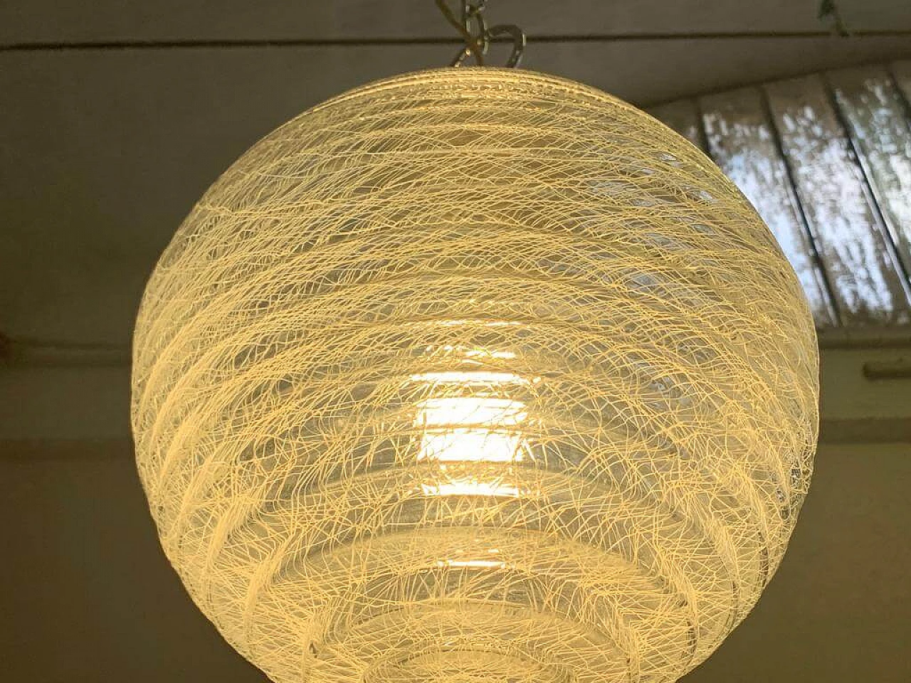 Pair of ball ceiling lamp with multi-strands engraving effect, 70s 1225879